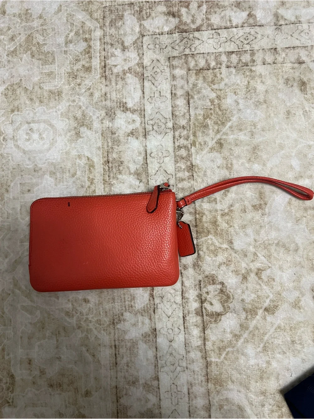Coach Pebbled Leather Wristlet in Salmon